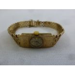 Accurist 9ct gold bark finish ladies bracelet watch, approx total weight 23.3g