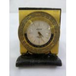 Aspreys Luxor gilt metal world time travel alarm clock in leather wallet