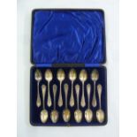 A cased set of Victorian twelve silver teaspoons, Birmingham 1900