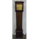 An oak cased grandmother chiming clock, the brass dial with Roman numerals, bearing the signature