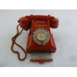 Red Bakelite telephone serial no. 332L PX56/2A with original cord