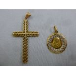 Yellow gold cross tested 18ct and a yellow gold Virgin Mary pendant tested 9ct, approx total