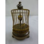 Automation bird in a cage clock with carrying handle on three ball feet, A/F