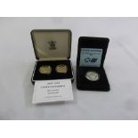 Two cased sets of silver œ2 coins to include 1986 Scottish Commonwealth Games and 1997/98 Old and