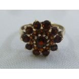 9ct yellow gold and garnet cluster ring, approx total weight 3.3g