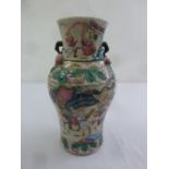A Chinese famile verte baluster vase with floral side handles