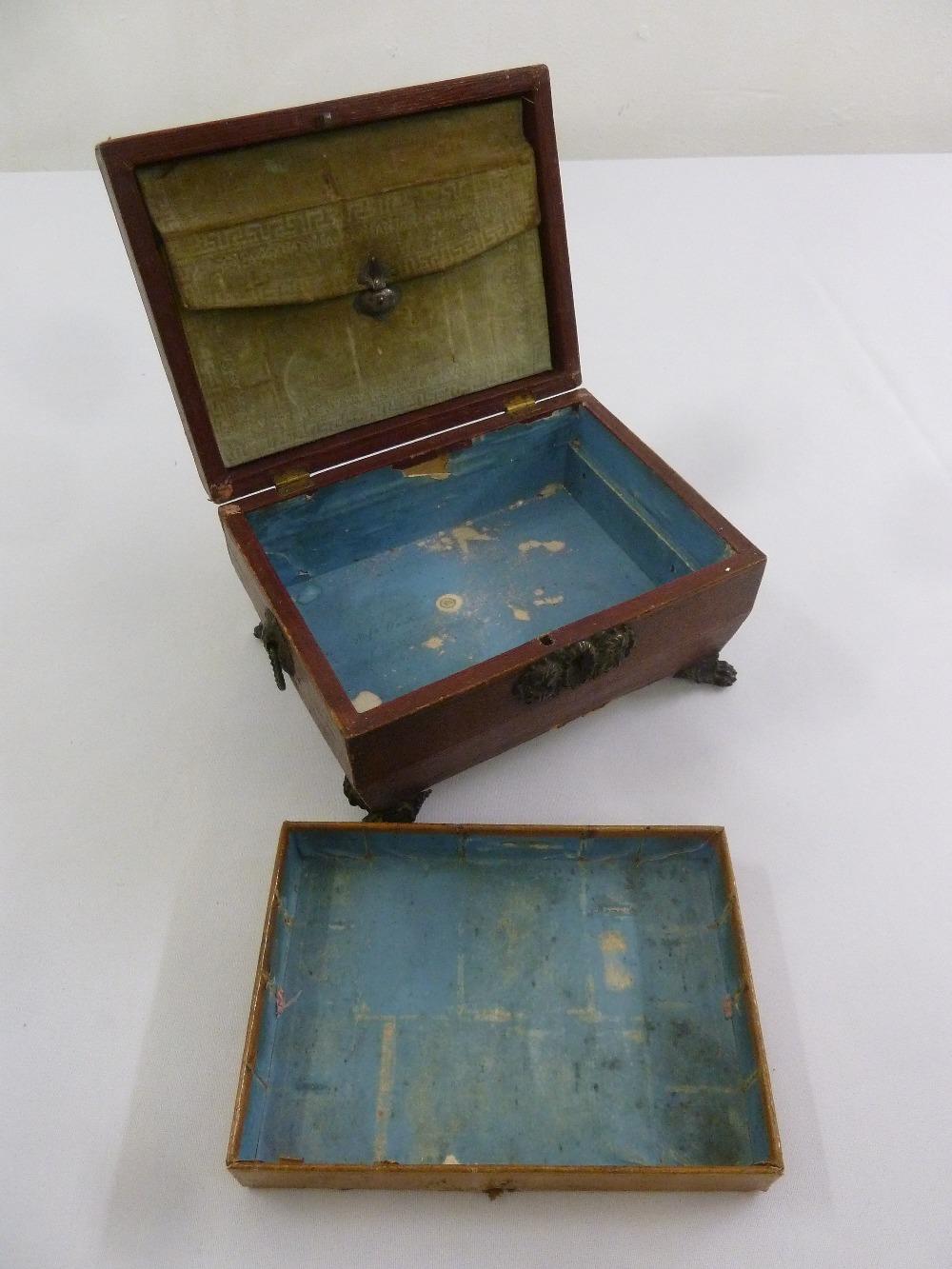 A Regency leather sarcophagus shaped work box with brass mounts on four paw feet - Image 2 of 2