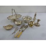 A quantity of silver plate to include fruit stands, bread basket and sugar sifter (10)