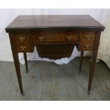 An Edwardian mahogany rectangular inlaid desk in the form of games and work table with five