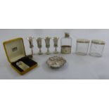 A quantity of silver to include four Kiddush cups, a hip flask, two dressing table jars with