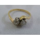 18ct yellow gold two stone diamond crossover ring, approx total weight 2.4g