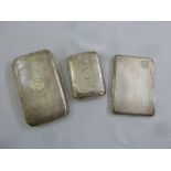 Three engine turned hallmarked silver cigarette cases