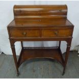 An Edwardian mahogany rectangular writing desk with two drawers on four tapering rectangular legs on