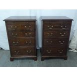 A pair of rectangular mahogany bedside chests with brass swing handles on four bracket feet