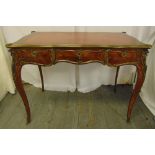 A French 19th century style Kingswood rectangular hall table with three drawers, gilded metal