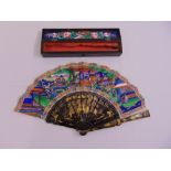 A Chinese 19th century hand painted lacquered and silk fan, sixteen section, in original