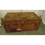 A rectangular steamer trunk with brass locks and hinged cover, A/F
