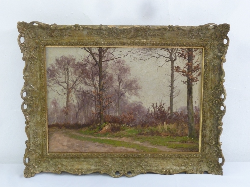 William Baptiste Baird (American 1847-1899) framed oil on canvas of a Woodland Scene, monogrammed,