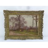 William Baptiste Baird (American 1847-1899) framed oil on canvas of a Woodland Scene, monogrammed,