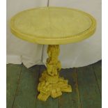 An Oriental composition circular table on carved triform base