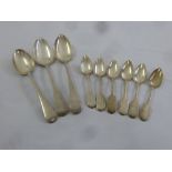 Three antique silver serving spoons and six teaspoons