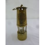 The Protector Lamp and Lighting Co. brass safety lamp with carrying handle