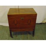 An Edwardian rectangular mahogany inlaid wine cellarette on four rectangular legs with original