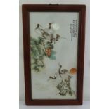 A Chinese hand painted porcelain panel of birds and flowers in rectangular hardwood frame, 89.5 x