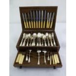 A cased set of mixed antique and modern silver flatware to include spoons, forks and bone handled