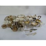 A quantity of silver plate to include trays, dishes and a toast rack