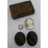 A quantity of collectables to include a horn and tortoiseshell snuff box, two carved cameos, a