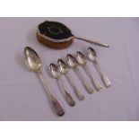 A quantity of silver to include a silver and tortoiseshell brush, five teaspoons and a dessert