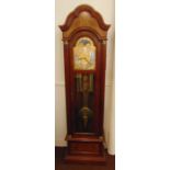 A mahogany striking long case clock by Westwood, the arched top, glazed hinged door, silvered with