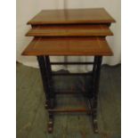 A nest of three rectangular mahogany side tables