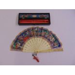 A Chinese Samshing hand painted 19th century ivory and silk fan, sixteen section, slight wear, in