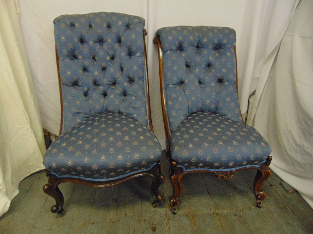 Victorian mahogany button back ladies chair on original castors and another similar