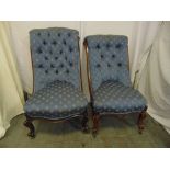 Victorian mahogany button back ladies chair on original castors and another similar