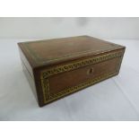 An Edwardian mahogany rectangular writing slope with inlaid brass mounts