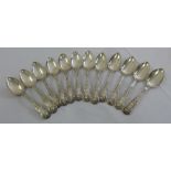 A set of twelve George IV silver Queens pattern dessert spoons, London 1827