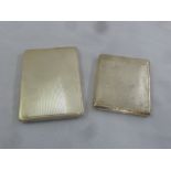 Two hallmarked engine turned silver cigarette cases