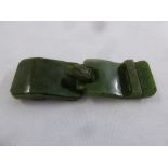 A Chinese green polished jade two part belt buckle with dragon head clasp