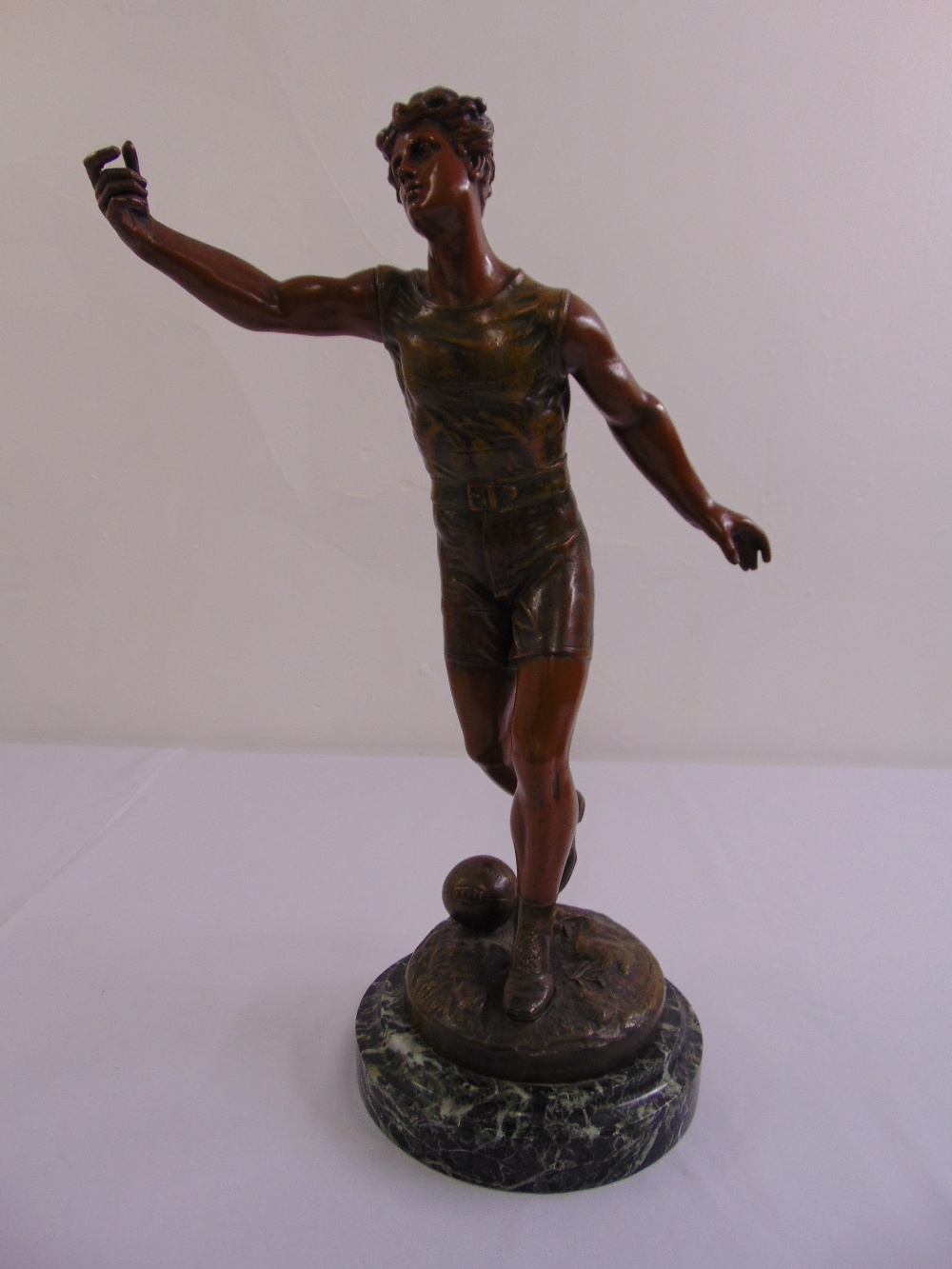 L. Guillemin French 1890 figurine of a soccer player on stepped marble circular base, signed to