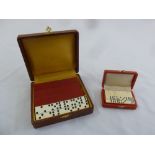 Two cased sets of dominoes, one miniature