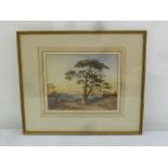 A framed and glazed watercolour of a country landscape, indistinctly signed bottom right, 22.5 x