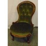 A Victorian button back ladies chair on scroll legs