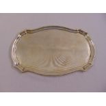 Goldsmiths & Silversmiths Company silver shaped oval dressing table tray, engine turned centre