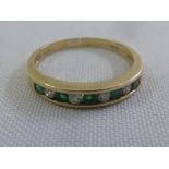 9ct yellow gold diamond and emerald channel set nine stone ring approx total weight 2.1g
