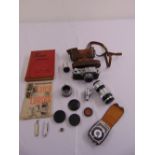 Leica No. 133402 camera in leather case, to include accessories and manual