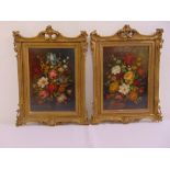 A pair of framed oils on board still life of flowers in the 17th century Dutch style, 27 x 19.5cm