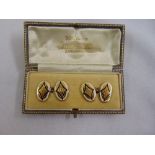 A pair of gold and enamel cufflinks tested 18ct, approx total weight 8.2 g